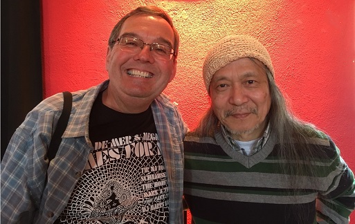Damo Suzuki and a fan